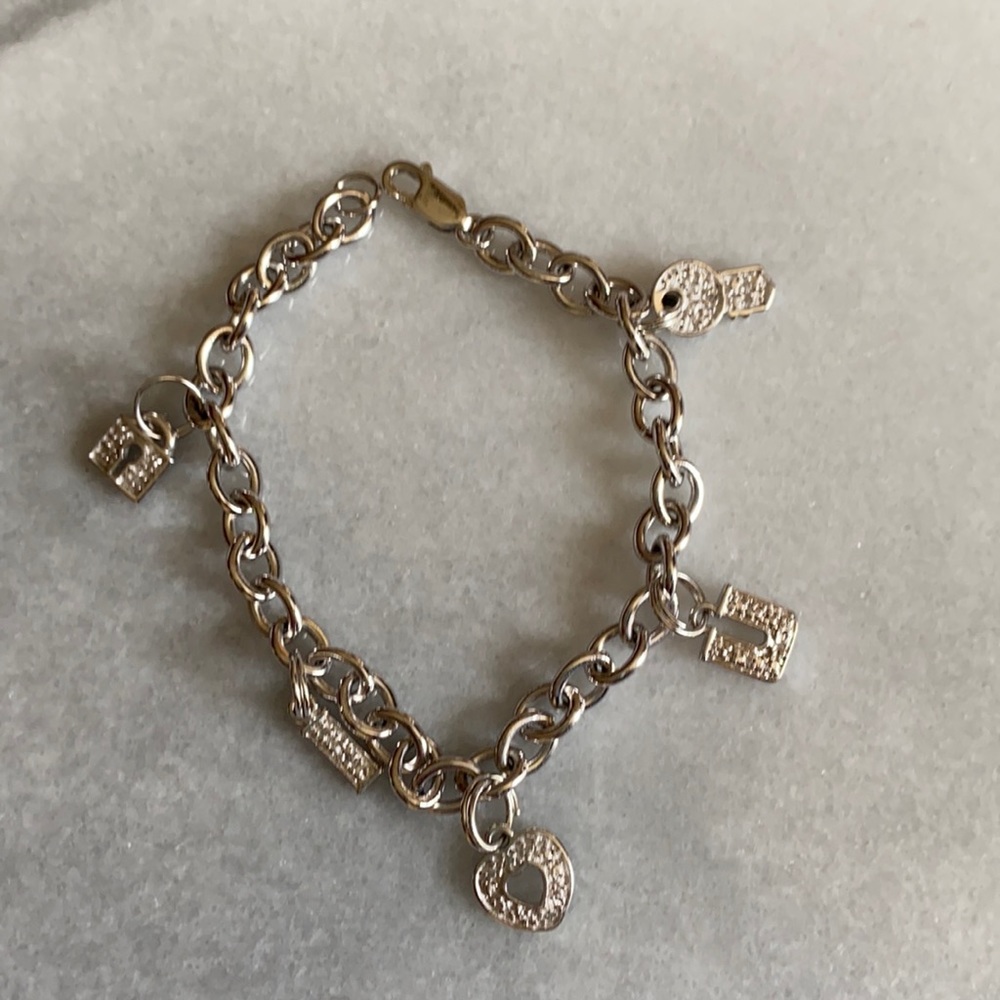 Charm Bracelet with 5 charms…locks and key